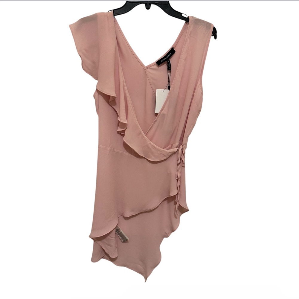 BCBGmaxazria new with tags size Small. Elegant Pink Asymmetrical Blouse